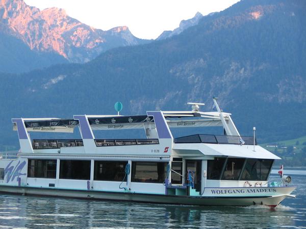 Wolfgang Amadeus ship on lake Wolfgang
All the day on round trips on lake Wolfgang, this ship returns in the evening to St.Wolfgang. In the background some mountains south of the lake in the light of the evening sun.